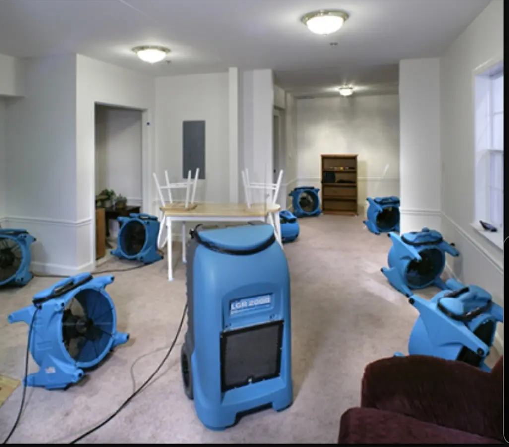 Air movers and dehumidifier setup for Water Damage Restoration in Woodside